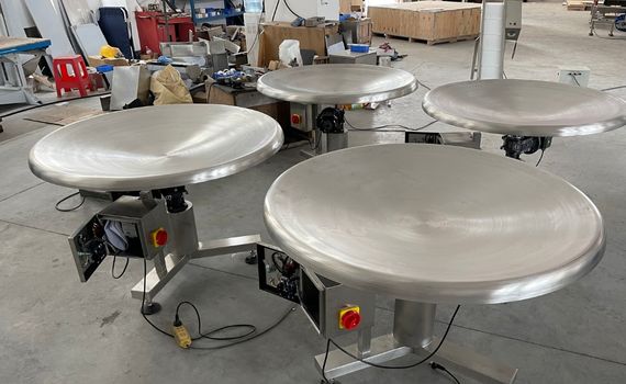 Rotary packing tables