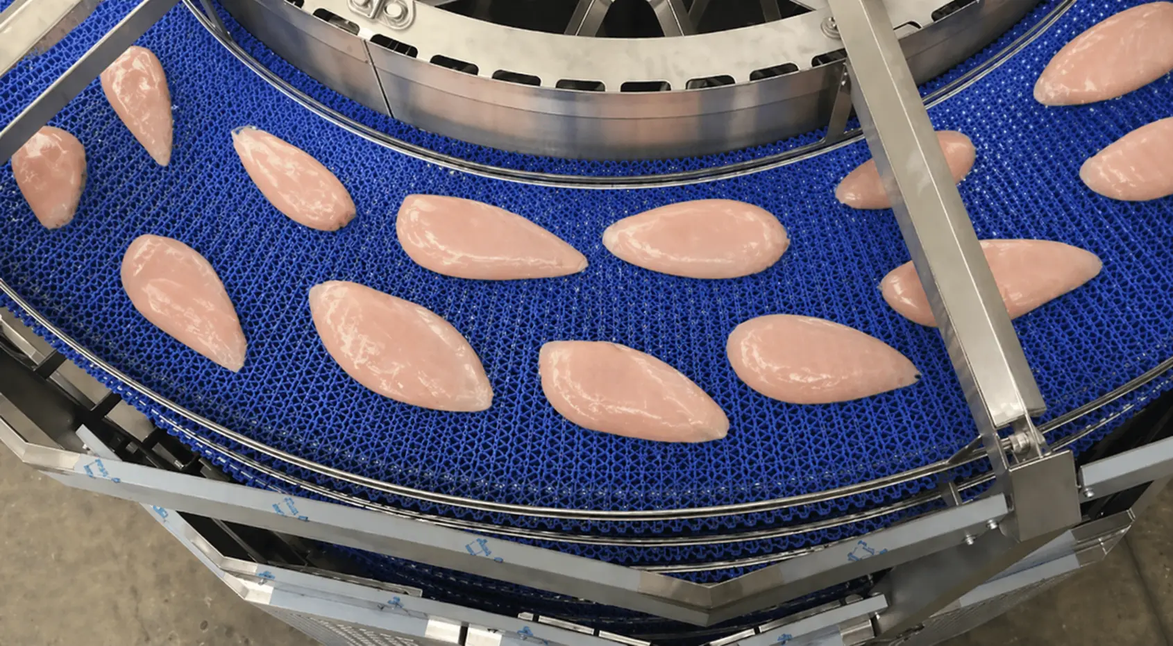 Spiral meat conveyor